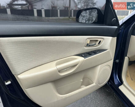 Синий Мазда 3, объемом двигателя 2 л и пробегом 192 тыс. км за 5999 $, фото 24 на Automoto.ua