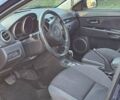 Синий Мазда 3, объемом двигателя 1.6 л и пробегом 217 тыс. км за 5400 $, фото 12 на Automoto.ua