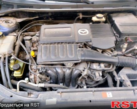 Синий Мазда 3, объемом двигателя 1.6 л и пробегом 160 тыс. км за 6000 $, фото 1 на Automoto.ua