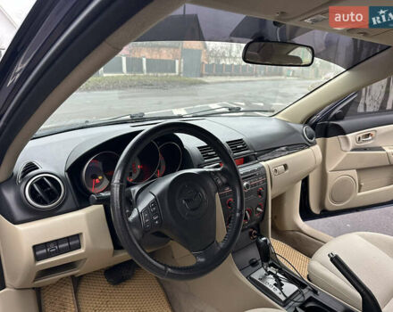 Синий Мазда 3, объемом двигателя 2 л и пробегом 192 тыс. км за 5999 $, фото 27 на Automoto.ua