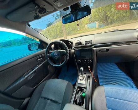 Синий Мазда 3, объемом двигателя 1.6 л и пробегом 237 тыс. км за 5300 $, фото 12 на Automoto.ua