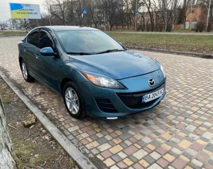 Синий Мазда 3, объемом двигателя 2 л и пробегом 297 тыс. км за 6999 $, фото 3 на Automoto.ua