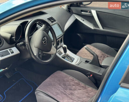 Синий Мазда 3, объемом двигателя 1.6 л и пробегом 206 тыс. км за 7500 $, фото 11 на Automoto.ua