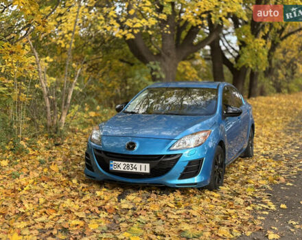Синий Мазда 3, объемом двигателя 1.6 л и пробегом 206 тыс. км за 7500 $, фото 1 на Automoto.ua