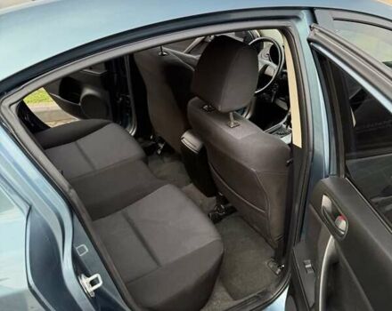 Синій Мазда 3, об'ємом двигуна 2 л та пробігом 185 тис. км за 6600 $, фото 4 на Automoto.ua