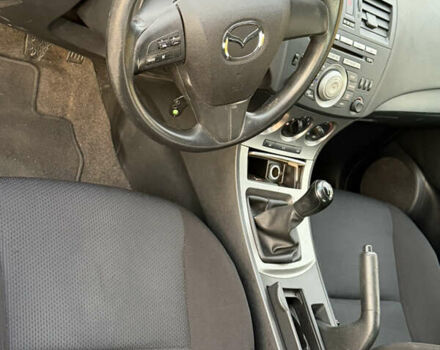 Синий Мазда 3, объемом двигателя 2 л и пробегом 111 тыс. км за 5600 $, фото 11 на Automoto.ua