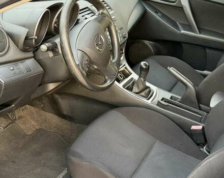 Синий Мазда 3, объемом двигателя 2 л и пробегом 111 тыс. км за 5600 $, фото 14 на Automoto.ua