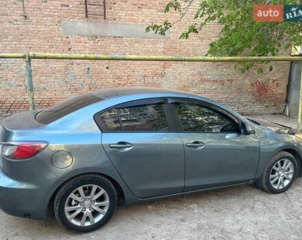 Синий Мазда 3, объемом двигателя 2 л и пробегом 160 тыс. км за 7300 $, фото 4 на Automoto.ua