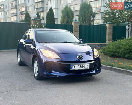 Синий Мазда 3, объемом двигателя 2 л и пробегом 180 тыс. км за 7300 $, фото 1 на Automoto.ua