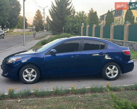 Синий Мазда 3, объемом двигателя 2 л и пробегом 180 тыс. км за 7300 $, фото 5 на Automoto.ua