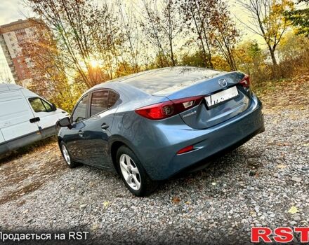 Синий Мазда 3, объемом двигателя 2 л и пробегом 137 тыс. км за 10590 $, фото 3 на Automoto.ua
