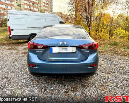 Синий Мазда 3, объемом двигателя 2 л и пробегом 137 тыс. км за 10590 $, фото 4 на Automoto.ua