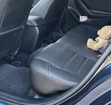 Синий Мазда 3, объемом двигателя 2 л и пробегом 165 тыс. км за 12500 $, фото 17 на Automoto.ua