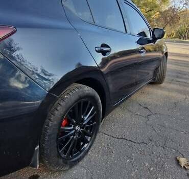 Синий Мазда 3, объемом двигателя 2 л и пробегом 165 тыс. км за 12500 $, фото 10 на Automoto.ua