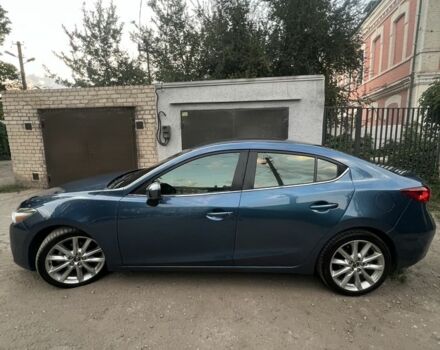 Синий Мазда 3, объемом двигателя 2 л и пробегом 157 тыс. км за 13315 $, фото 2 на Automoto.ua