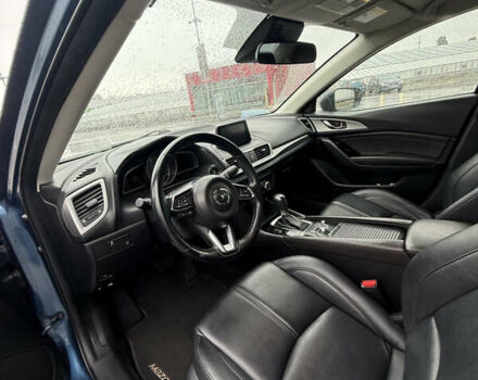 Синий Мазда 3, объемом двигателя 2 л и пробегом 161 тыс. км за 13000 $, фото 17 на Automoto.ua