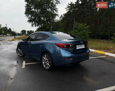Синій Мазда 3, об'ємом двигуна 2.49 л та пробігом 77 тис. км за 15600 $, фото 4 на Automoto.ua