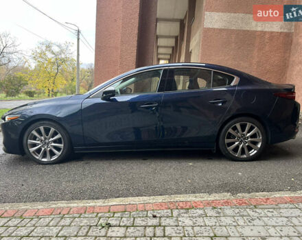 Синий Мазда 3, объемом двигателя 2.49 л и пробегом 50 тыс. км за 18000 $, фото 3 на Automoto.ua