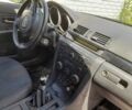 Синий Мазда 3, объемом двигателя 1.6 л и пробегом 273 тыс. км за 3569 $, фото 1 на Automoto.ua