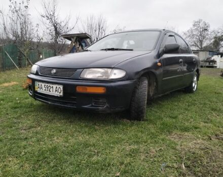 Синий Мазда 3, объемом двигателя 1.5 л и пробегом 260 тыс. км за 1300 $, фото 1 на Automoto.ua