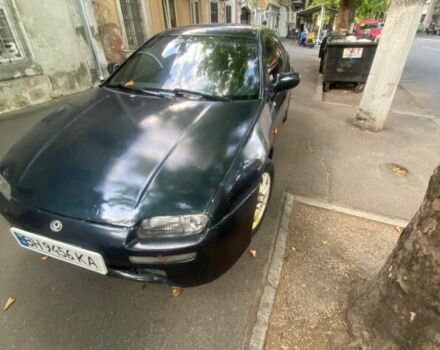 Синий Мазда 3, объемом двигателя 1.5 л и пробегом 250 тыс. км за 1350 $, фото 1 на Automoto.ua