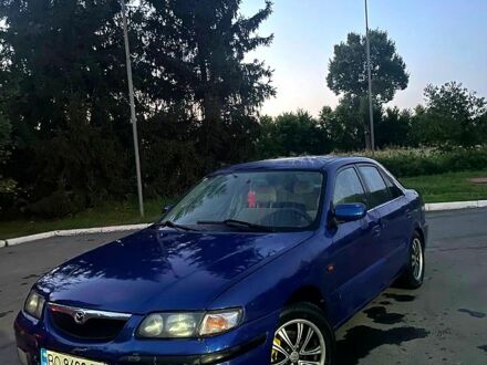 Синий Мазда 3, объемом двигателя 1.8 л и пробегом 0 тыс. км за 1400 $, фото 1 на Automoto.ua