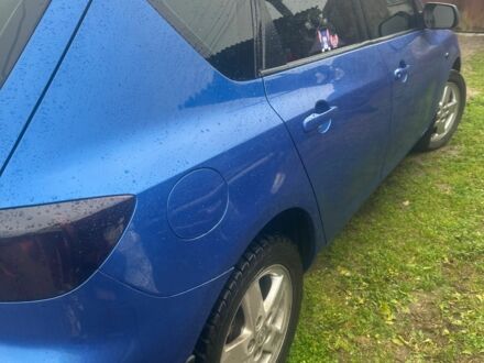 Синій Мазда 3, об'ємом двигуна 2 л та пробігом 287 тис. км за 5700 $, фото 1 на Automoto.ua