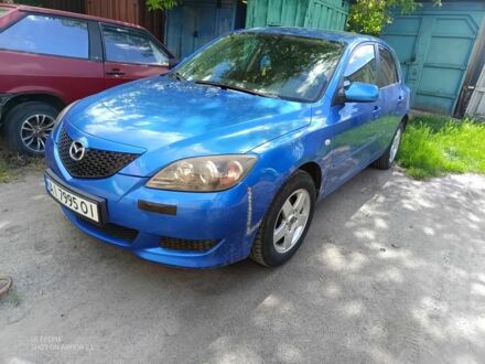 Синий Мазда 3, объемом двигателя 1.6 л и пробегом 250 тыс. км за 2999 $, фото 1 на Automoto.ua