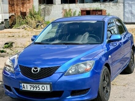 Синий Мазда 3, объемом двигателя 1.6 л и пробегом 250 тыс. км за 4100 $, фото 1 на Automoto.ua