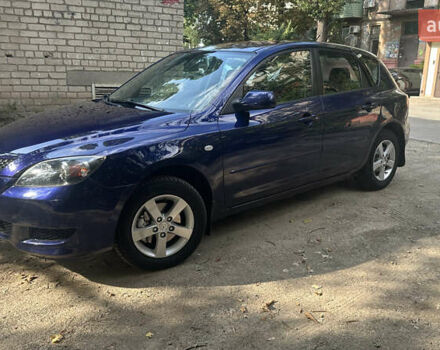 Синий Мазда 3, объемом двигателя 1.6 л и пробегом 243 тыс. км за 4000 $, фото 1 на Automoto.ua