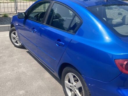 Синий Мазда 3, объемом двигателя 1.6 л и пробегом 233 тыс. км за 3550 $, фото 1 на Automoto.ua