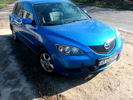 Синий Мазда 3, объемом двигателя 1.3 л и пробегом 168 тыс. км за 3850 $, фото 1 на Automoto.ua