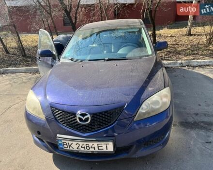 Синий Мазда 3, объемом двигателя 1.3 л и пробегом 224 тыс. км за 2800 $, фото 1 на Automoto.ua