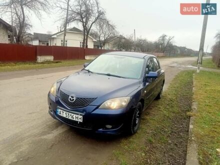 Синій Мазда 3, об'ємом двигуна 1.35 л та пробігом 260 тис. км за 2500 $, фото 1 на Automoto.ua