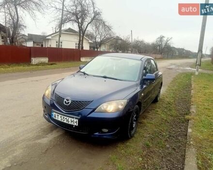 Синій Мазда 3, об'ємом двигуна 1.35 л та пробігом 260 тис. км за 2500 $, фото 1 на Automoto.ua