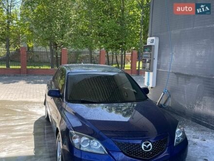 Синий Мазда 3, объемом двигателя 1.6 л и пробегом 252 тыс. км за 4400 $, фото 1 на Automoto.ua