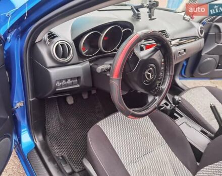 Синий Мазда 3, объемом двигателя 1.56 л и пробегом 253 тыс. км за 4200 $, фото 1 на Automoto.ua