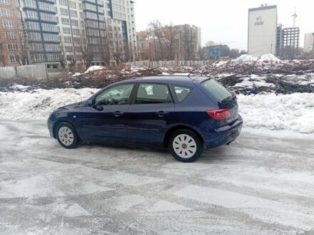 Синій Мазда 3, об'ємом двигуна 1.3 л та пробігом 260 тис. км за 4700 $, фото 1 на Automoto.ua