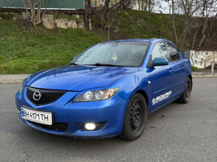 Синий Мазда 3, объемом двигателя 2 л и пробегом 325 тыс. км за 4500 $, фото 1 на Automoto.ua