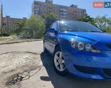 Синий Мазда 3, объемом двигателя 1.6 л и пробегом 182 тыс. км за 4000 $, фото 1 на Automoto.ua