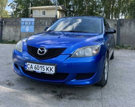 Синий Мазда 3, объемом двигателя 1.3 л и пробегом 214 тыс. км за 4004 $, фото 1 на Automoto.ua