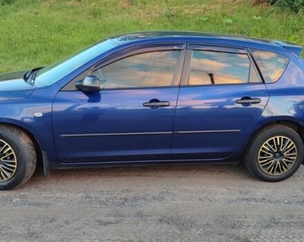 Синий Мазда 3, объемом двигателя 1.3 л и пробегом 219 тыс. км за 4000 $, фото 1 на Automoto.ua