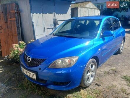 Синий Мазда 3, объемом двигателя 1.6 л и пробегом 253 тыс. км за 4200 $, фото 1 на Automoto.ua