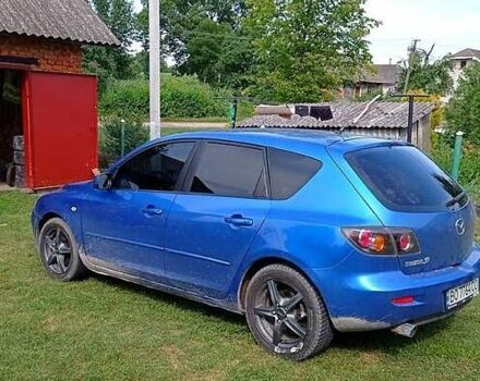 Синий Мазда 3, объемом двигателя 1.6 л и пробегом 204 тыс. км за 4500 $, фото 1 на Automoto.ua