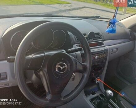 Синій Мазда 3, об'ємом двигуна 1.3 л та пробігом 220 тис. км за 3700 $, фото 1 на Automoto.ua