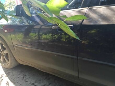 Синий Мазда 3, объемом двигателя 1.6 л и пробегом 250 тыс. км за 1600 $, фото 1 на Automoto.ua