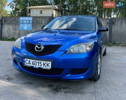 Синий Мазда 3, объемом двигателя 1.4 л и пробегом 214 тыс. км за 4000 $, фото 1 на Automoto.ua