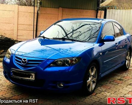 Синий Мазда 3, объемом двигателя 2 л и пробегом 240 тыс. км за 4200 $, фото 1 на Automoto.ua