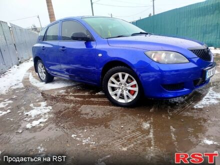 Синий Мазда 3, объемом двигателя 2 л и пробегом 230 тыс. км за 4500 $, фото 1 на Automoto.ua