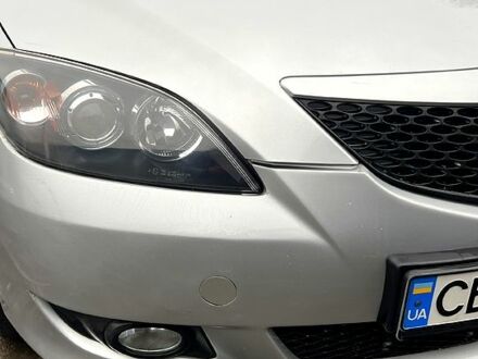 Синий Мазда 3, объемом двигателя 1.8 л и пробегом 188 тыс. км за 4450 $, фото 1 на Automoto.ua